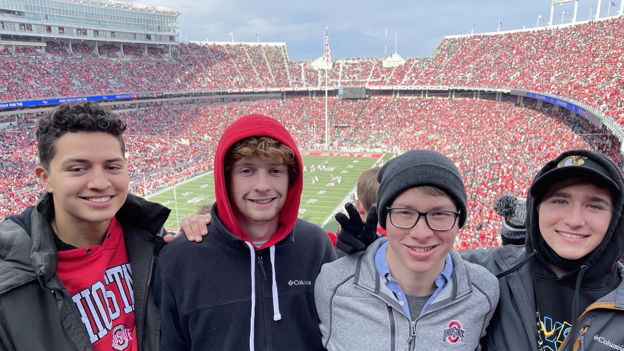 Jonah Clark with friends watching a Buckeye football game in Ohio Stadium